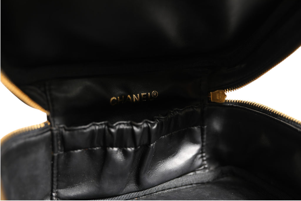 Chanel Black and gold makeup bag